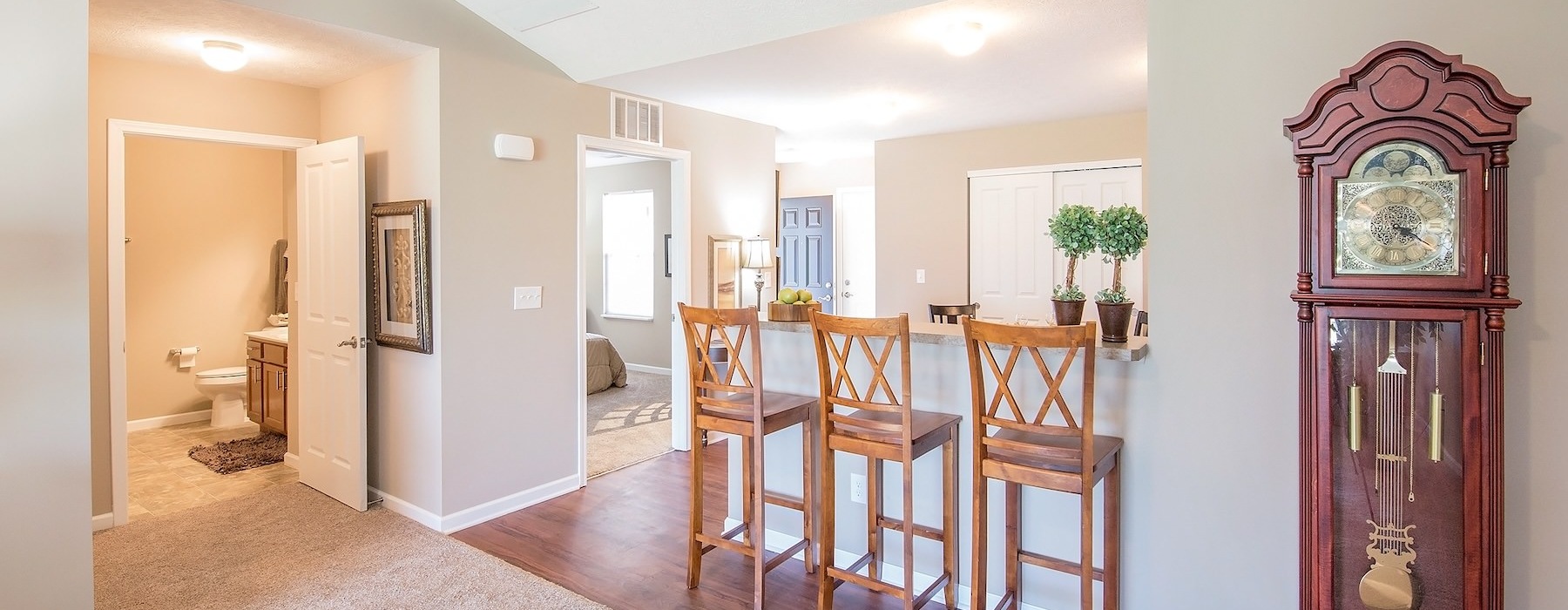 a dining room with a table and chairs